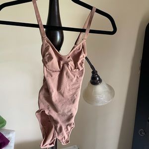 Skims Sculpting Snaps Bodysuit in Sienna